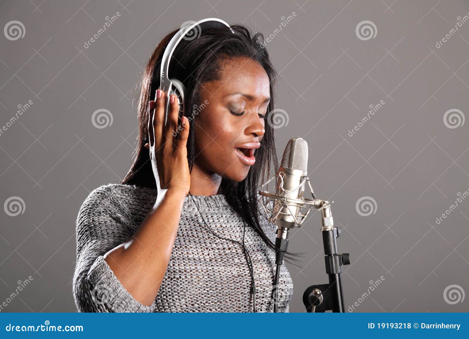 making music beautiful black woman singing in mic