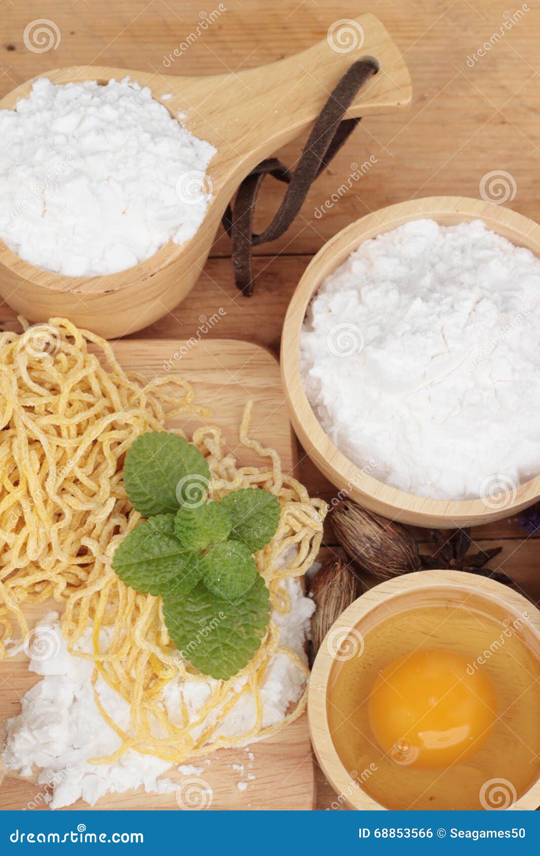 Making Noodle with Wheat Flour and Egg for Cooking. Stock Photo Image