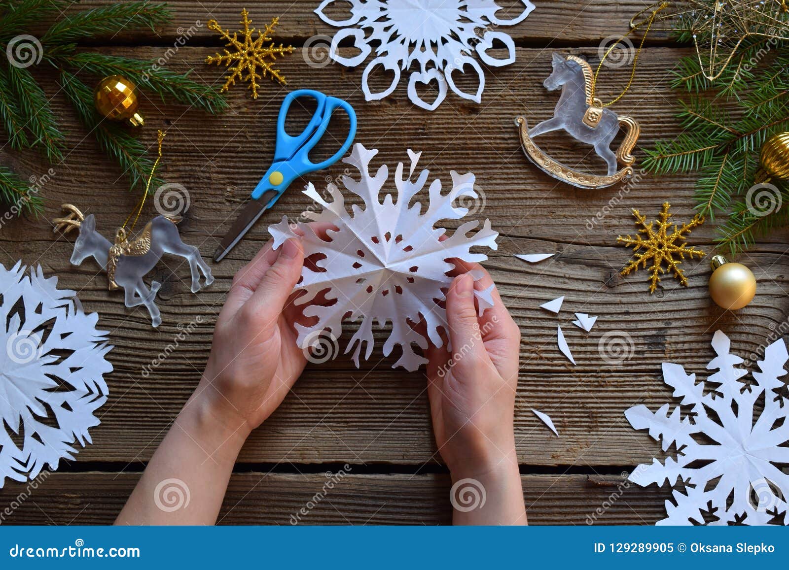 How to make a paper snowflake Christmas ornament