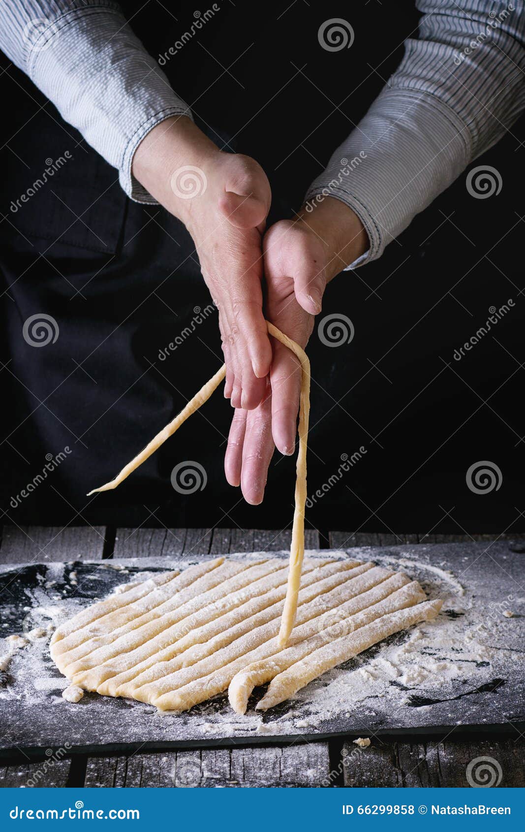 making pasta by female hands