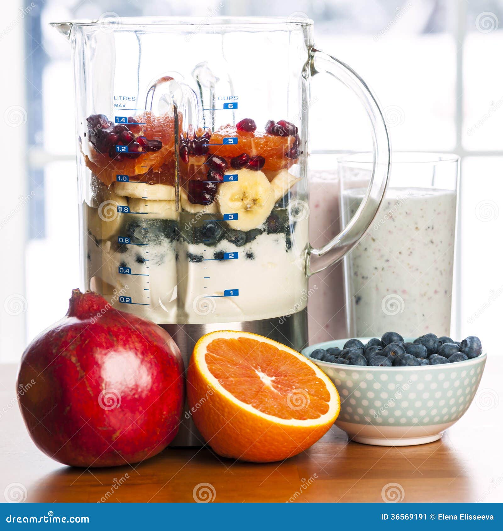 Making Smoothies in Blender with Fruit and Yogurt Stock Image - Image