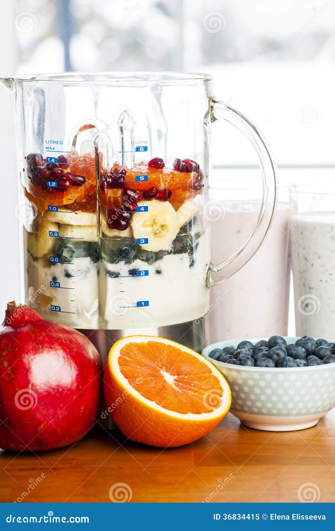 Making Smoothies in Blender with Fruit and Yogurt Stock Image - Image