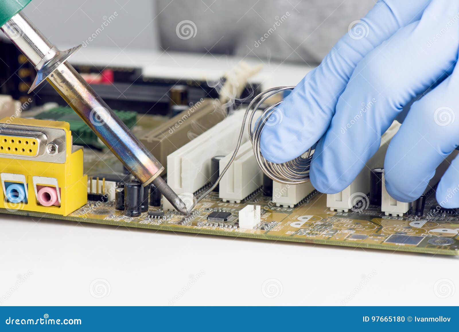 Making a Soldering on Motherboard Microchip Stock Photo Image of