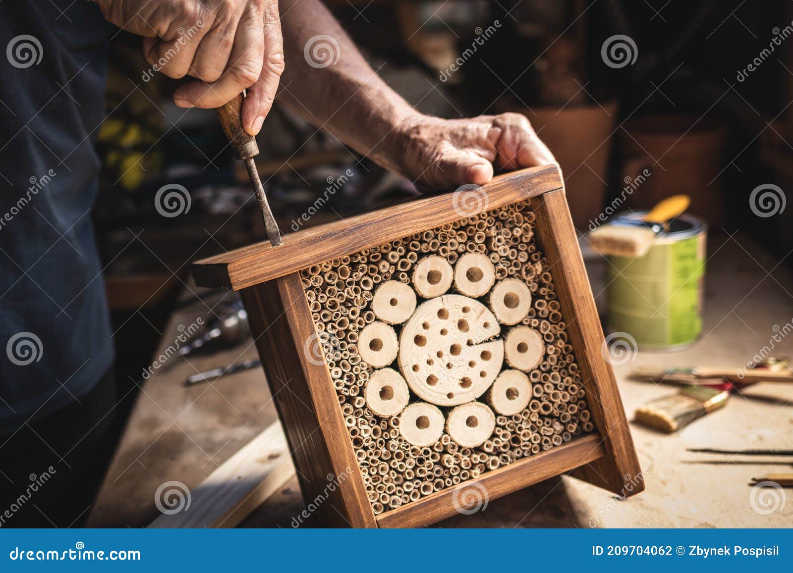making wooden insect hotel in workshop