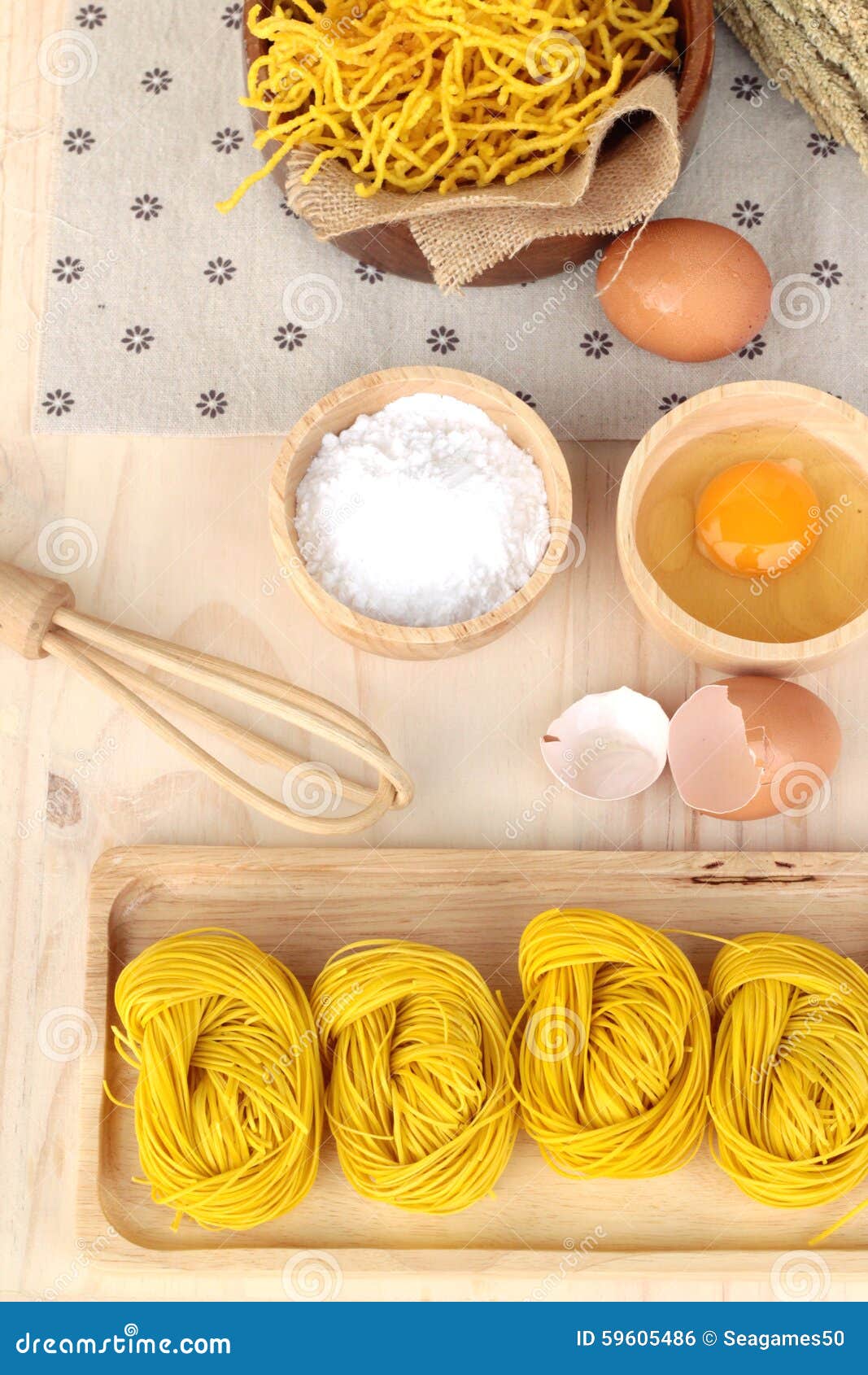 Making Yellow Noodle with Egg and Wheat Flour. Stock Photo Image of