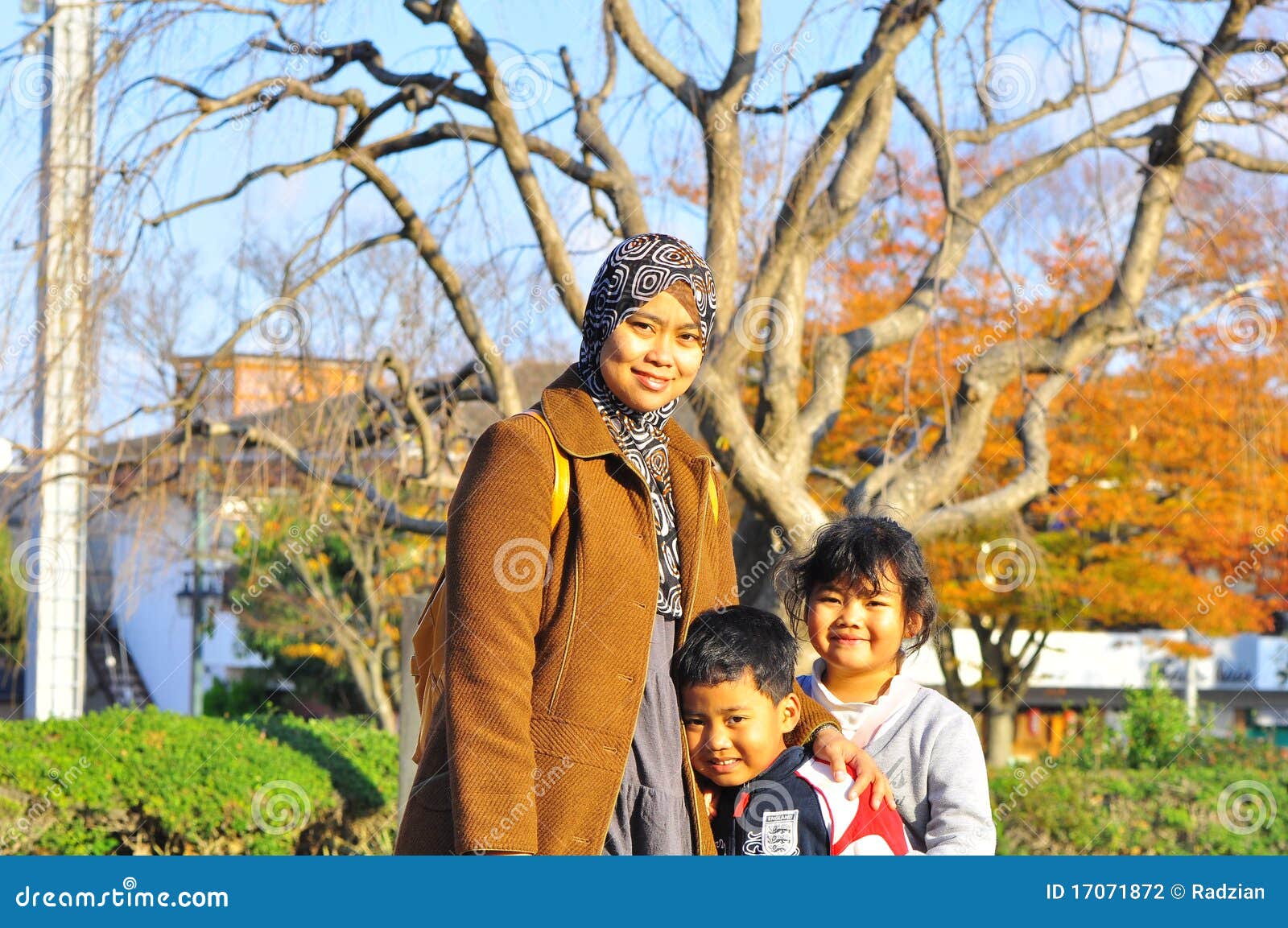 A Malay Family Posing For The Camera In Autumn Stock Photo Image Of Cute Happy 17071872