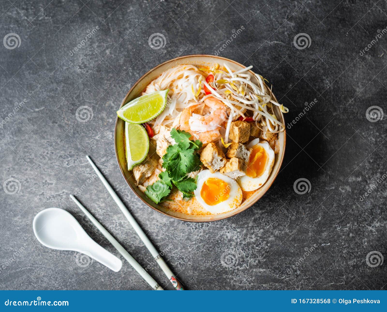 Malaysian Noodles Laksa Soup with Chicken, Prawn and Tofu in a Bowl on ...