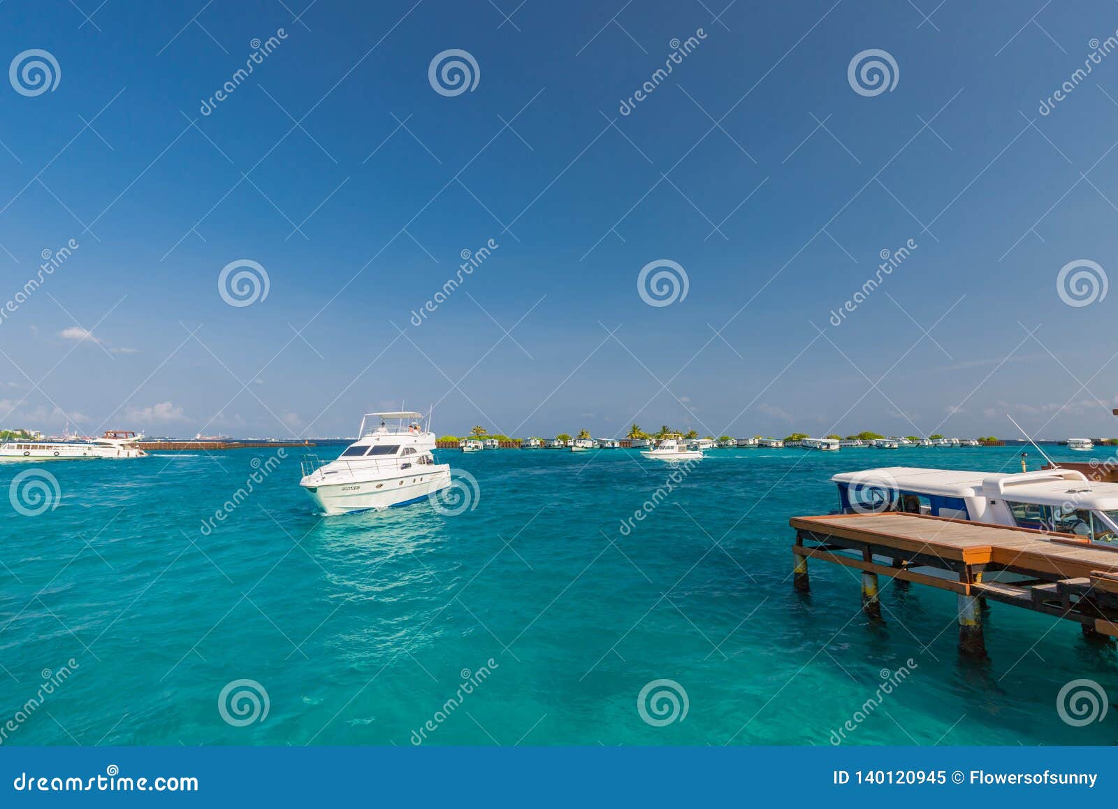 05.03.18 - Male Maldives Airport Dock and Boats Picking Up Tourists Next To  Male Capitol City of Maldives. Luxury Speedboat Coming Editorial Image -  Image of impressive, clear: 140120945