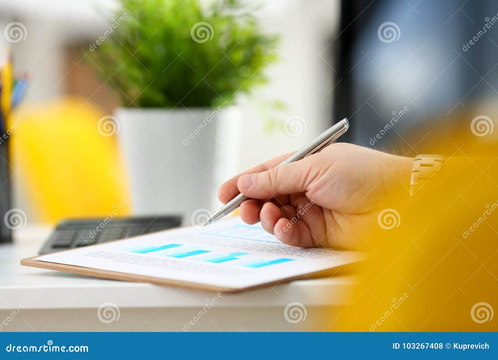 Male Arm Hold Silver Pen Examining Stats Graphic Stock Photo - Image of ...