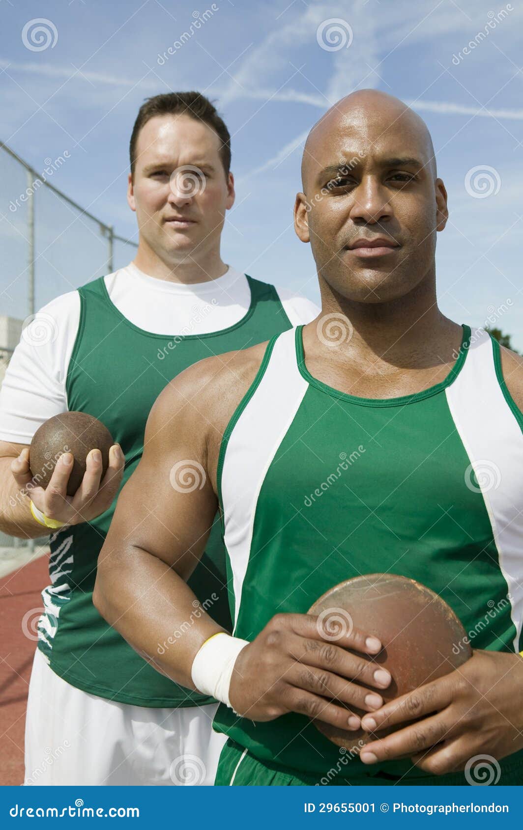 Male Athletes Holding Shot Put and Discus Stock Image Image of field, fitness 29655001