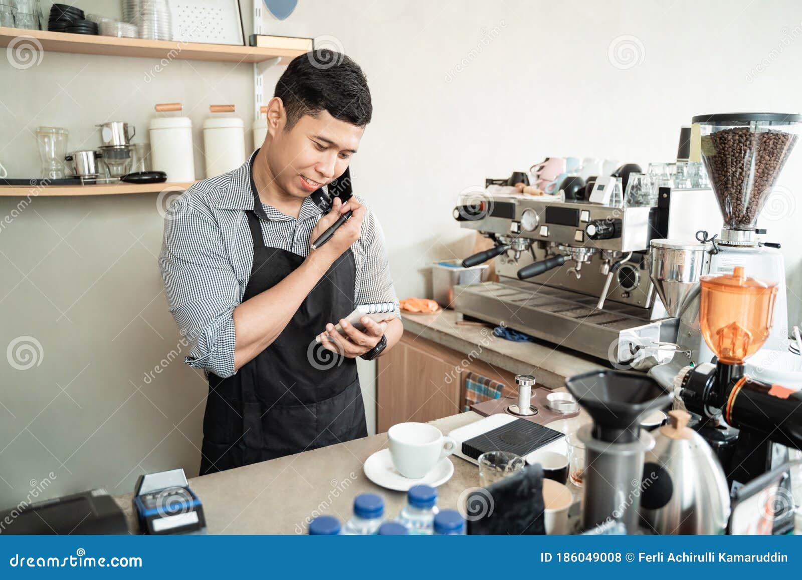 Male Barista Calling Using Smartphone Stock Photo Image of attractive