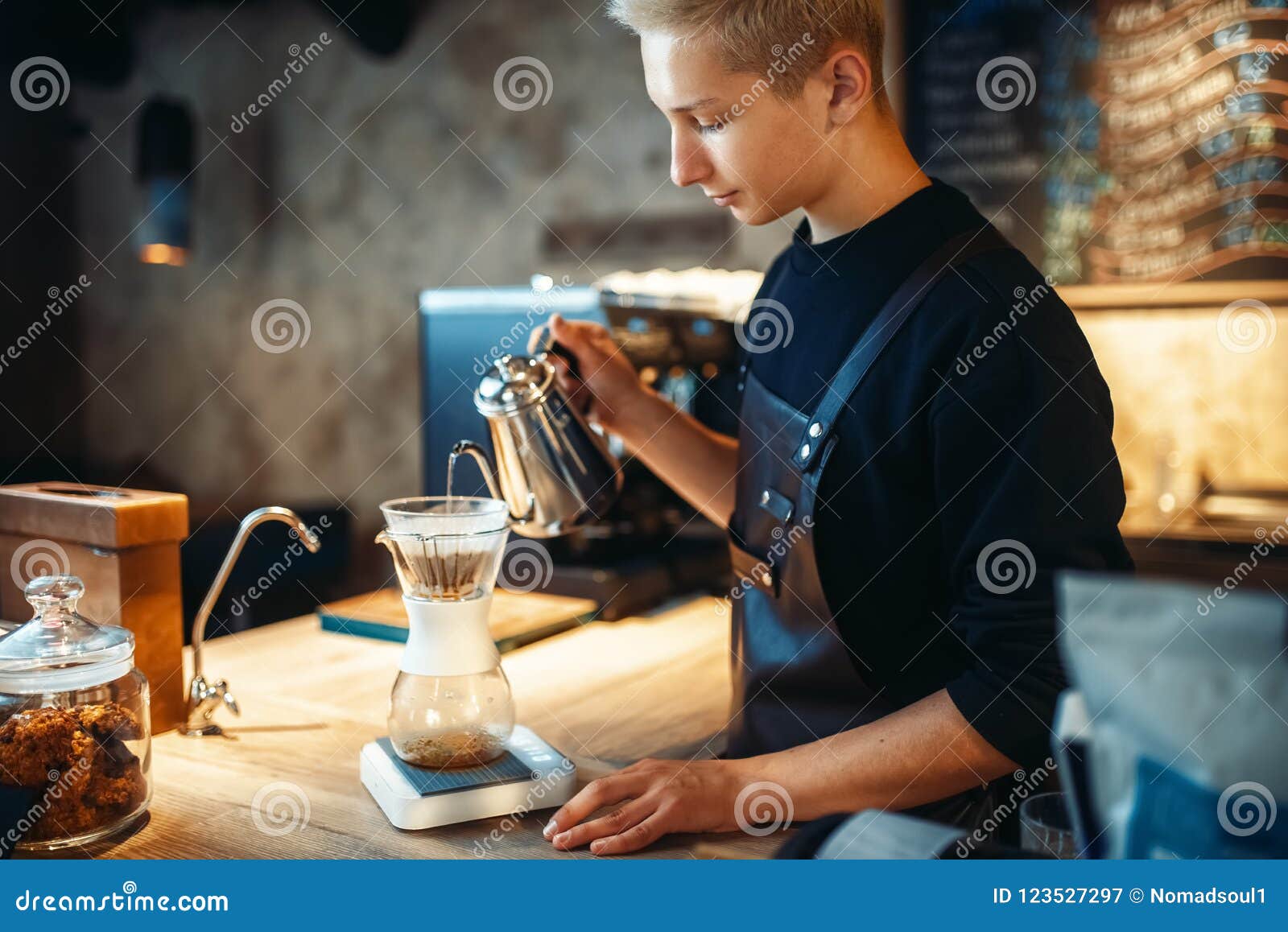 Male Barista Pours Ground Coffee Into The Glass Stock Image Image Of male-barista-pours-ground-coffee-into-the-glass-stock-image-image-of