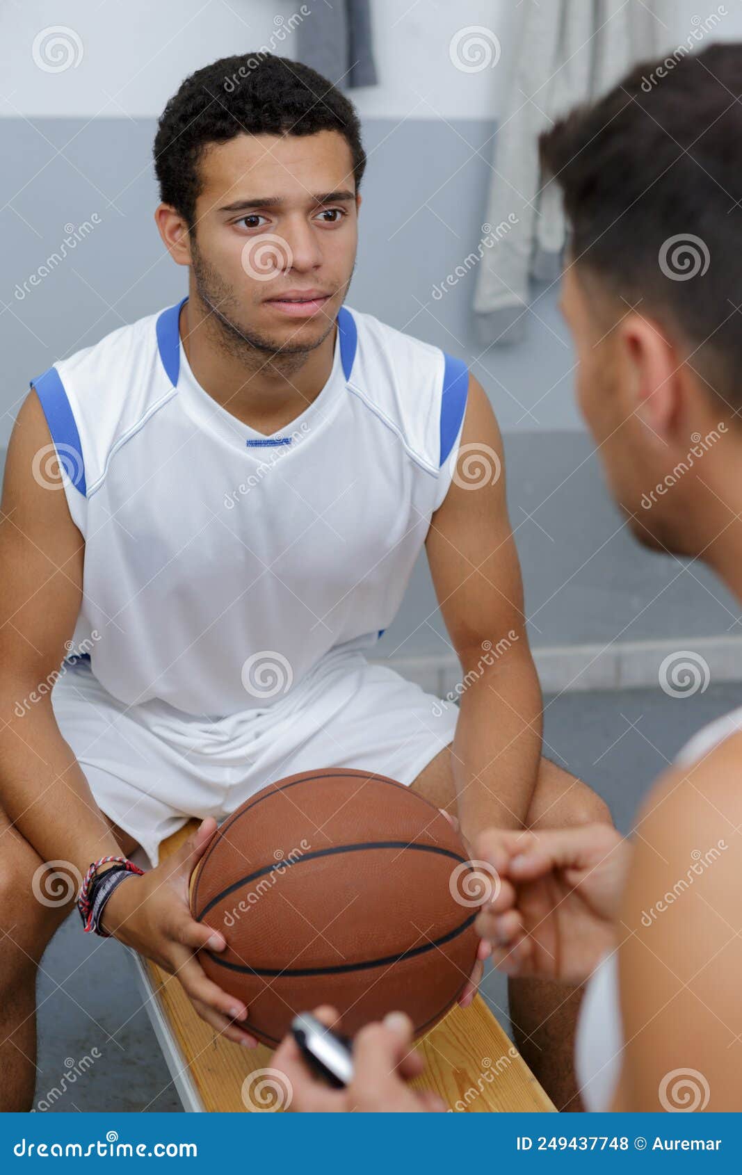 Male Basketball Player Practicing with Male Coach Stock Photo Image