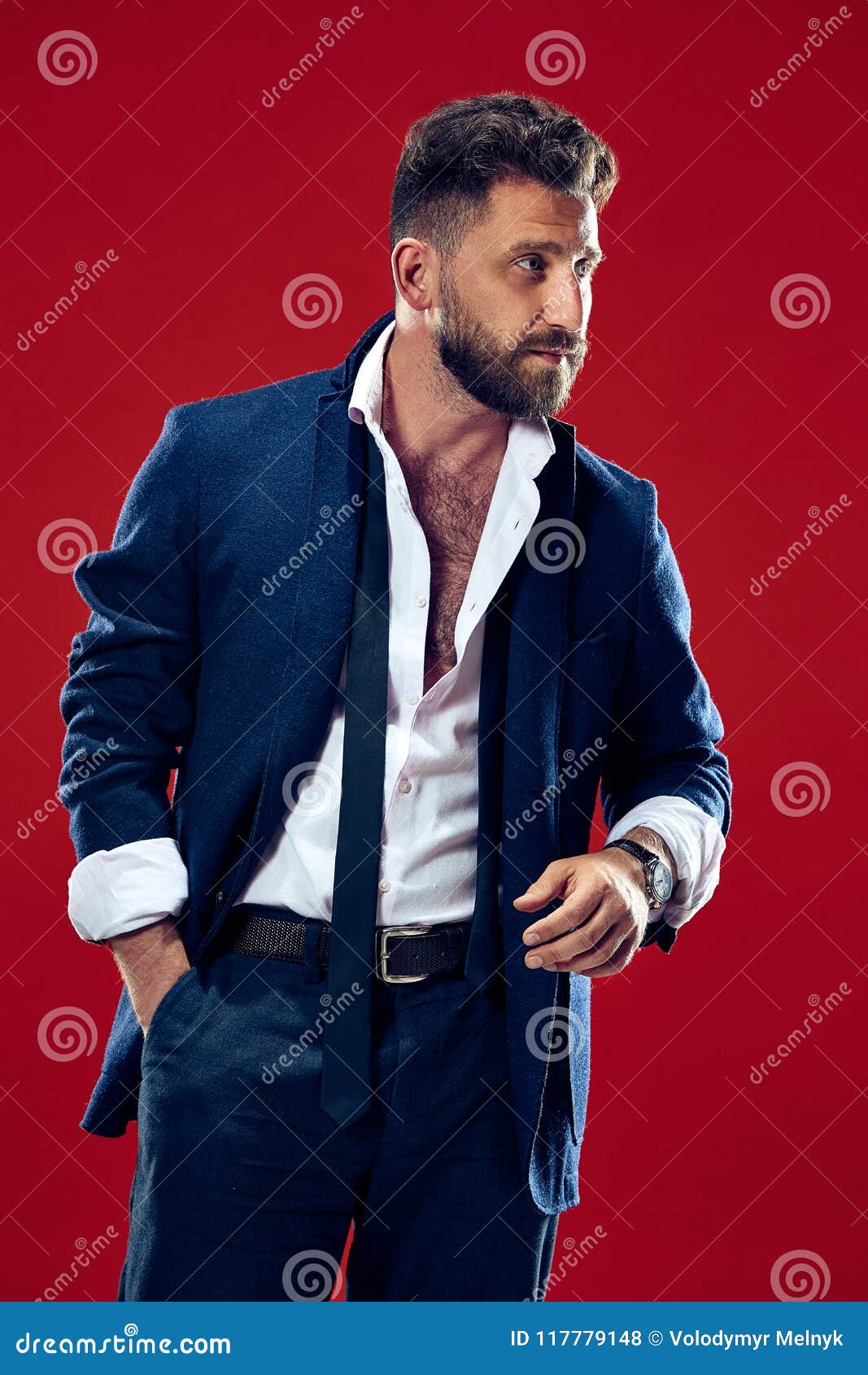Male Beauty Concept. Portrait of a Fashionable Young Man with Stylish Haircut Wearing Trendy Suit Posing Over Red Stock Photo - Image of hair, background: 117779148 Male Beauty Concept. Portrait of a Fashionable Young Man with Stylish Haircut Wearing Trendy Suit Posing Over Red Stock Photo - Image of hair, background: 117779148