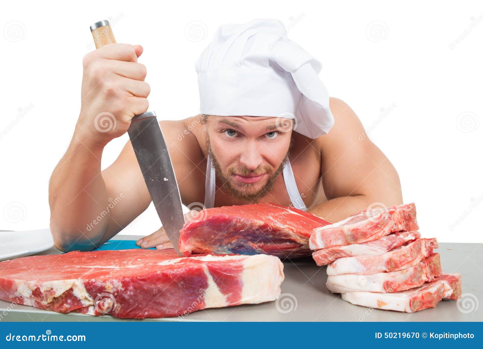 Male Bodybuilder Chef Cuts Raw Meat. Stock Photo Image of handsome