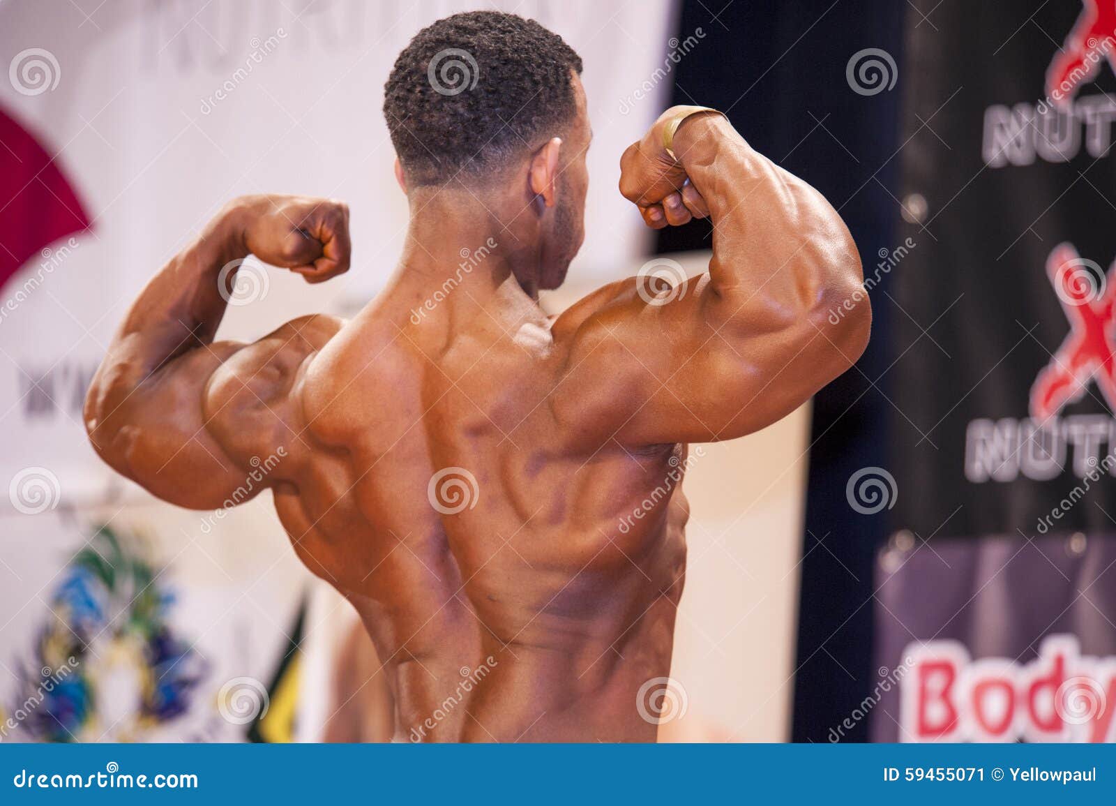 Male Bodybuilder Shows His Best Back Double Biceps Pose Editorial Photo 