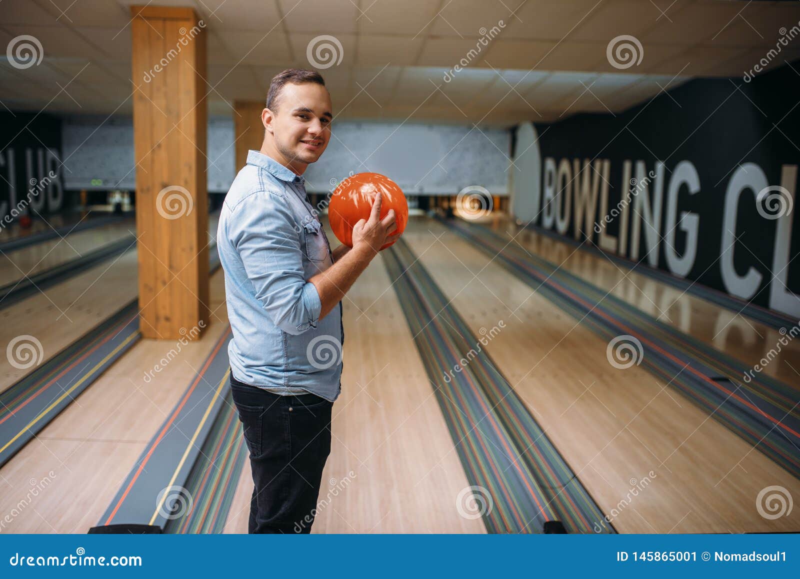 Bowling ball and house shoes on lane in club Stock Photo by NomadSoul1