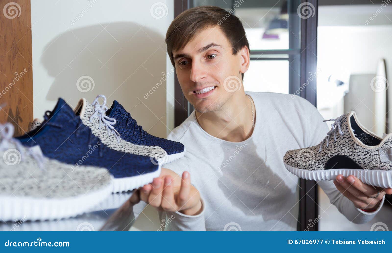 Male buying summer shoes stock image. Image of purchase - 67826977