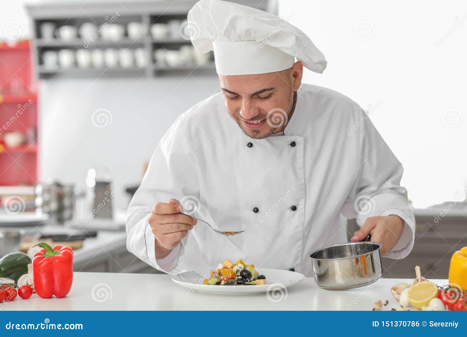 Male Chef Dressing Tasty Salad in Kitchen Stock Photo Image of dish