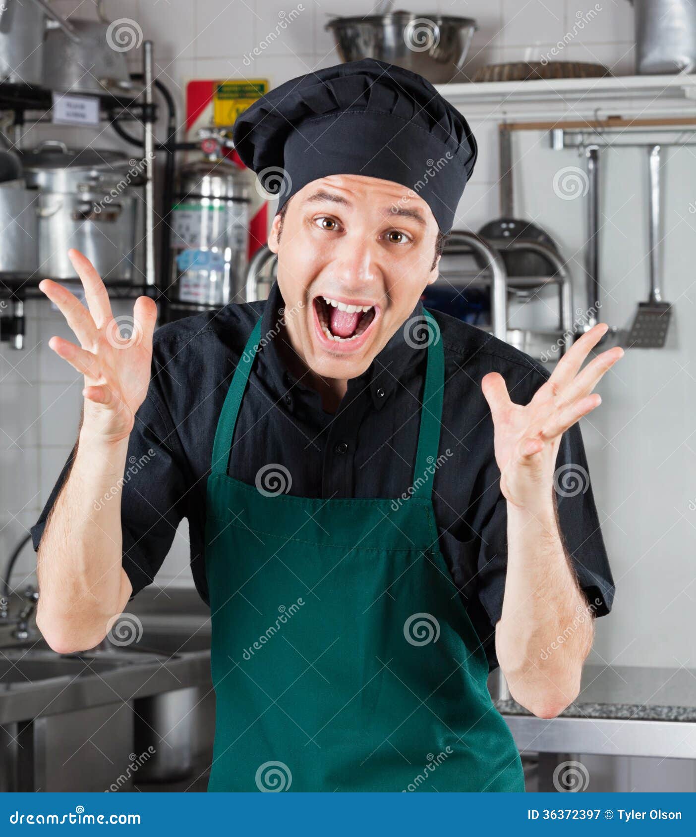 Funny Cooking. Attractive Caucasian Man In The Kitchen Stock Photo, Picture  and Royalty Free Image. Image 65857067.