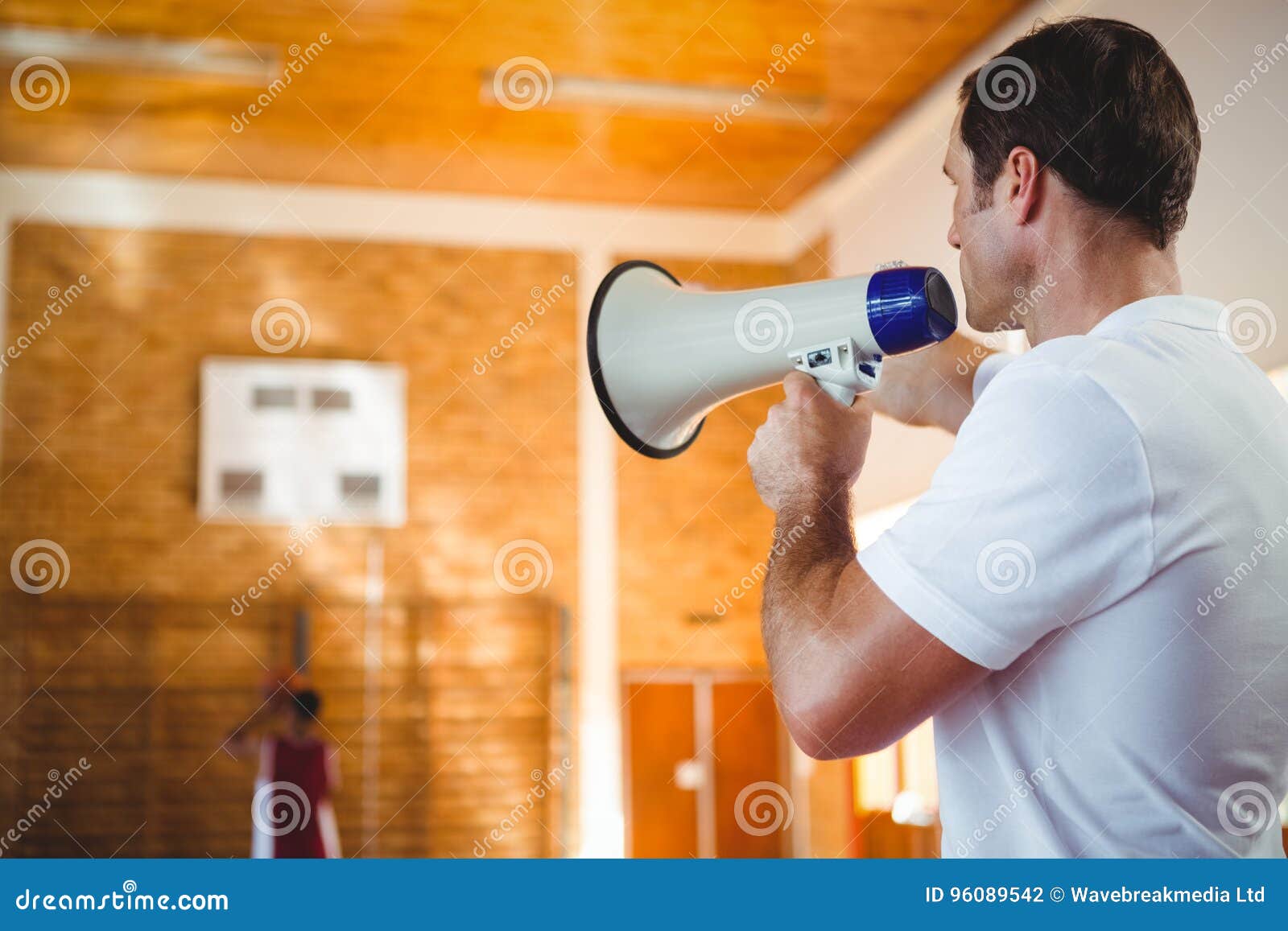 Male coach using megaphone stock photo. Image of focus 96089542