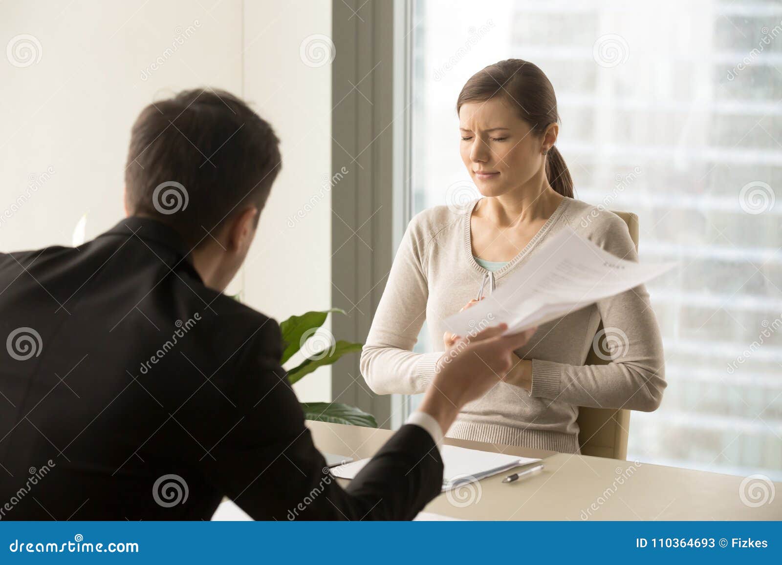 angry boss scolding scared female employee