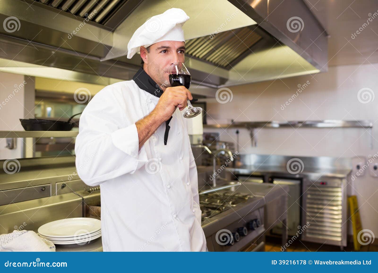 Male Cook Drinking Red Wine in Kitchen Stock Photo Image of whites