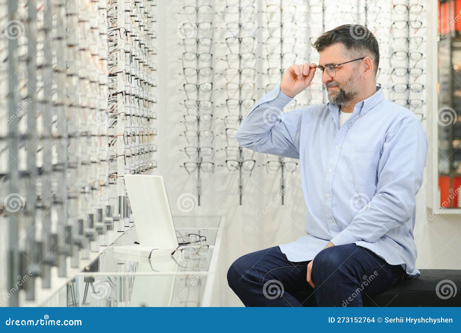 Male Customer Choosing Glasses in Optics Store Stock Photo Image of