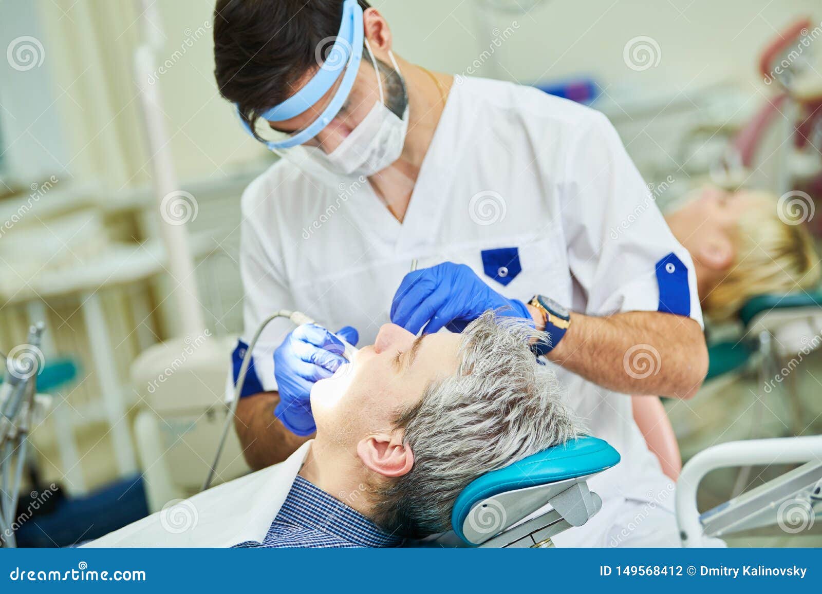 Dentist At Work In Dental Room Stock Image CartoonDealer 3397747 dentist-at-work-in-dental-room-stock-image-cartoondealer-3397747