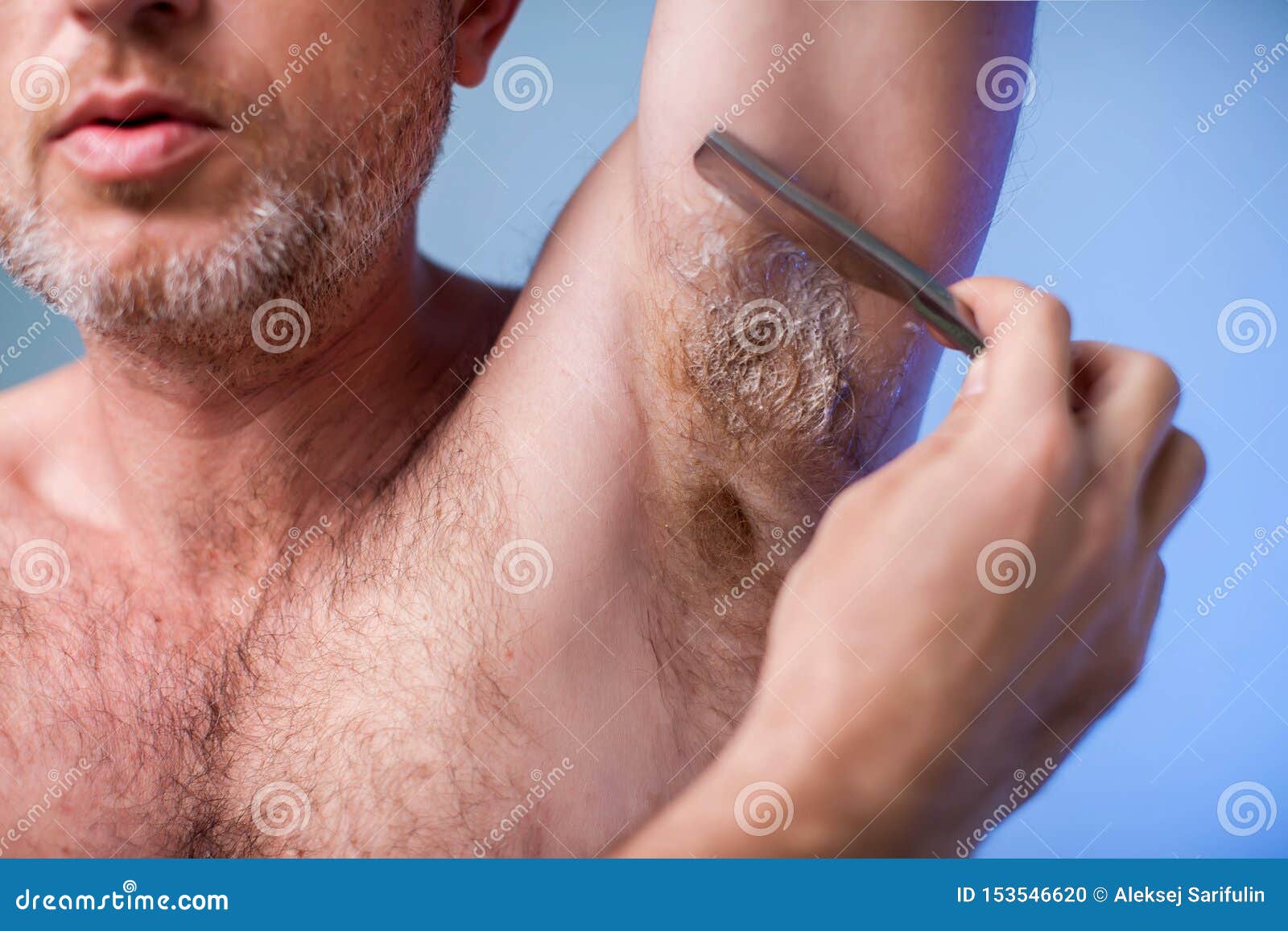 Male Depilation. Young Attractive Man Using Razor To Remove Hair from His  Armpit. People and Bodycare Concept Stock Photo - Image of handsome,  caucasian: 153546620