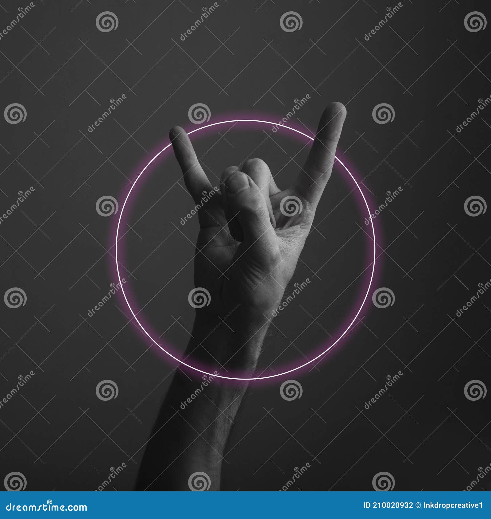 Male Devil Horn Rock and Roll Hand Gesture with Abstract Neon Light