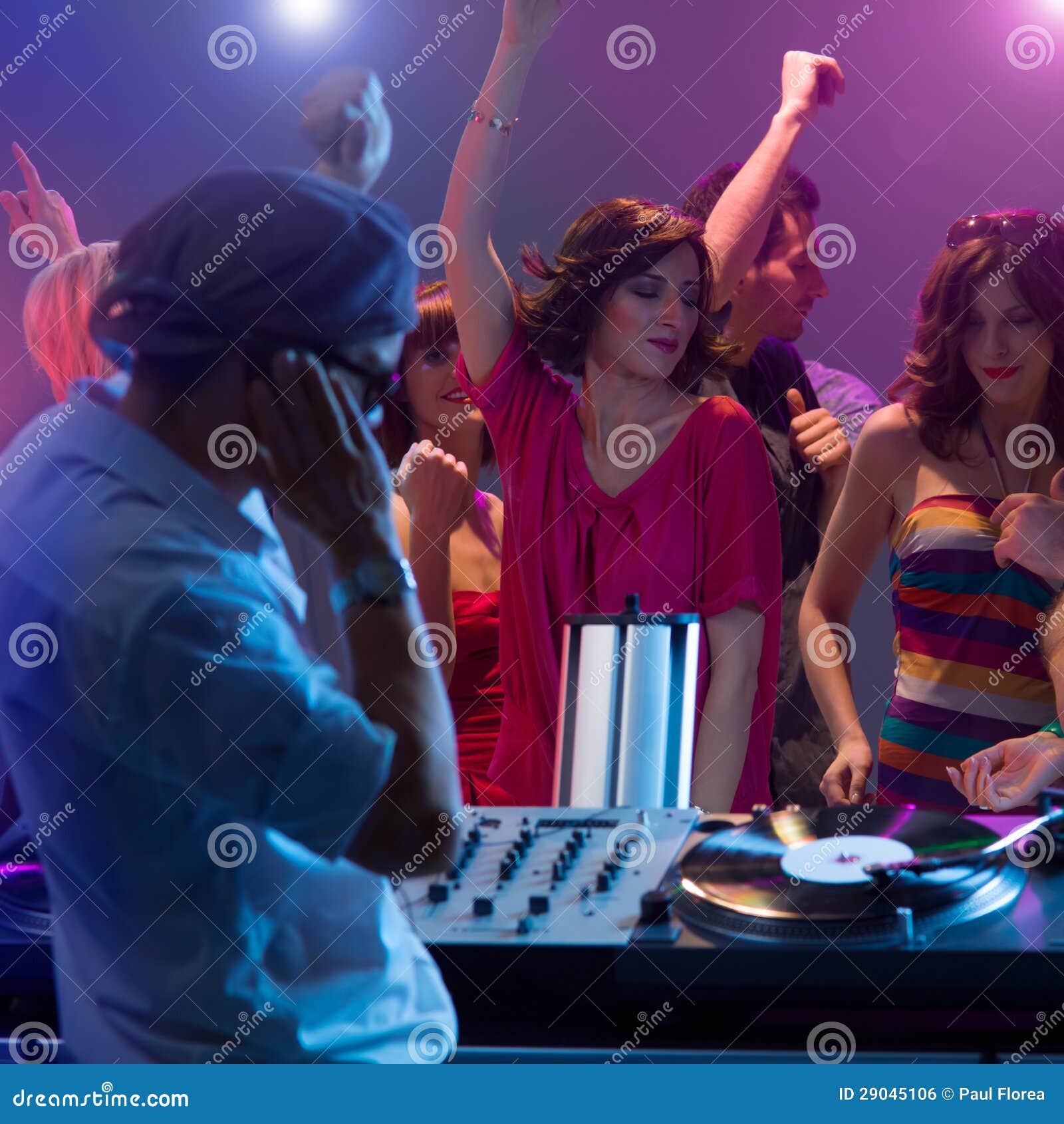 Male Dj Mixing Music at Party with Dancing People Stock Photo - Image ...