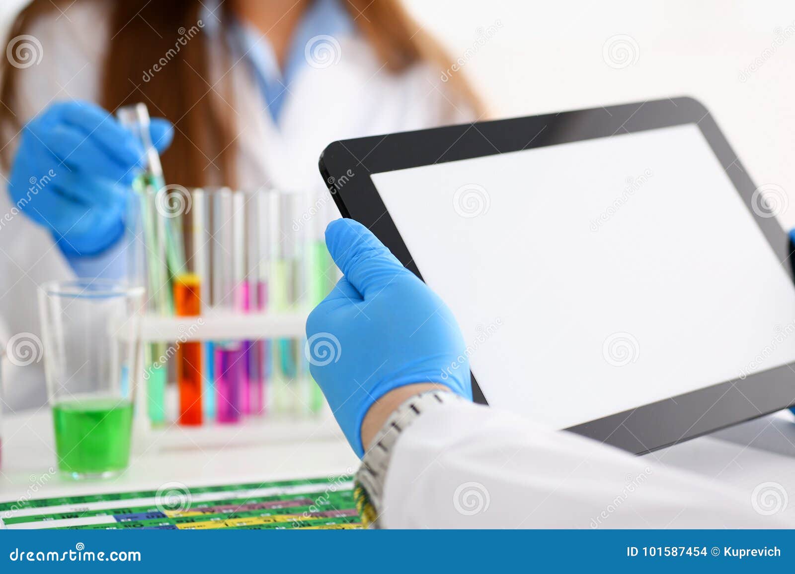A Male Doctor in a Chemical Laboratory Holds a Tablet Stock Photo ...