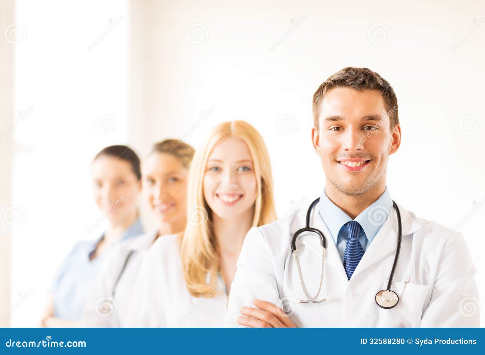 Male Doctor in Front of Medical Group Stock Photo Image of doctor