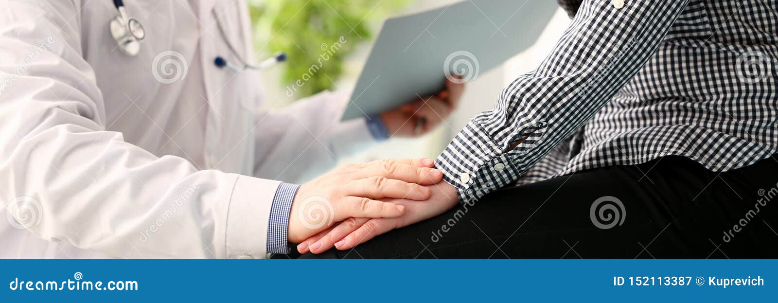 male doctor hold pacient female arm
