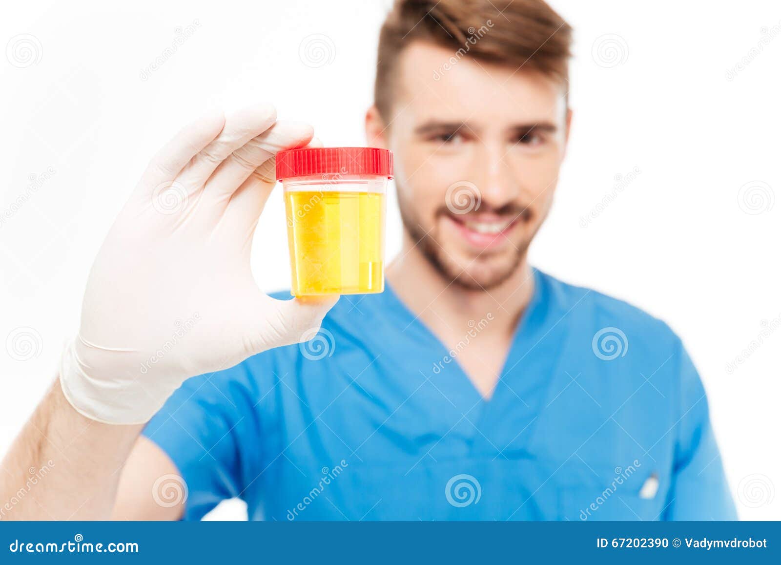 male doctor holding bottle of urine sample