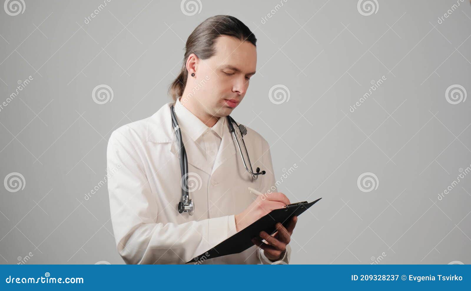Cheerful Patient In Gown Looking At Blurred Free Stock Photo and Image  632104982