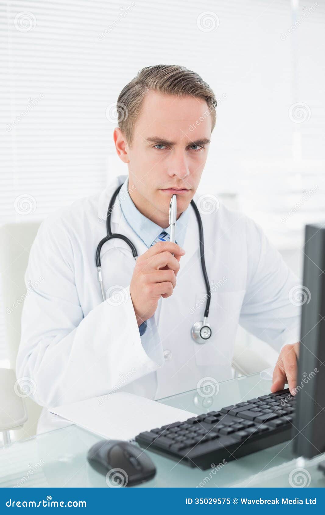 Male Doctor Using Computer at Medical Office Stock Image Image of service, coat 35029575
