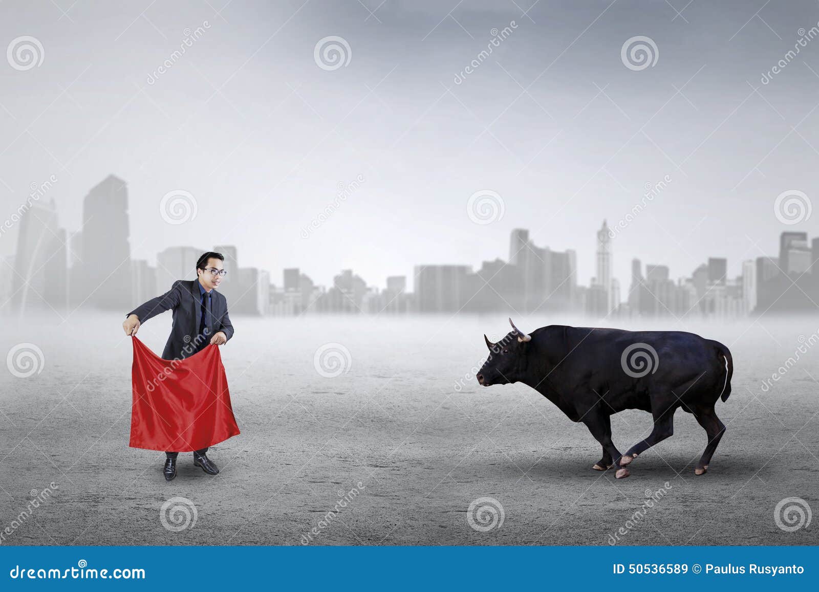 Male Entrepreneur Fighting with a Bull Stock Image - Image of city