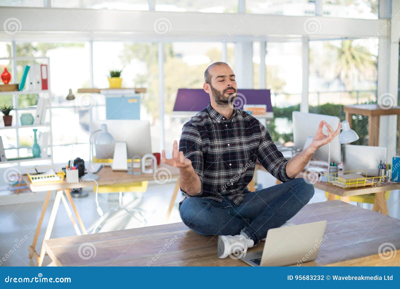 Male Executive Doing Yoga In Office Stock Photo Image Of