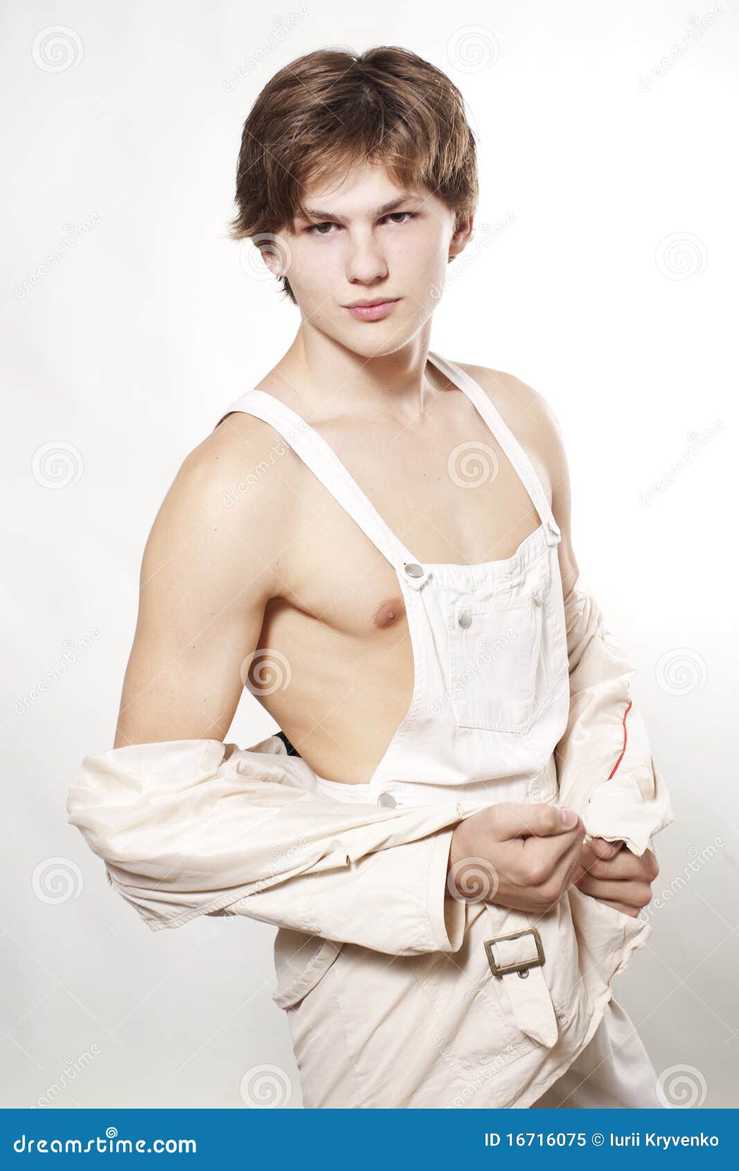 Male fashion model posing stock image. Image of overalls 16716075
