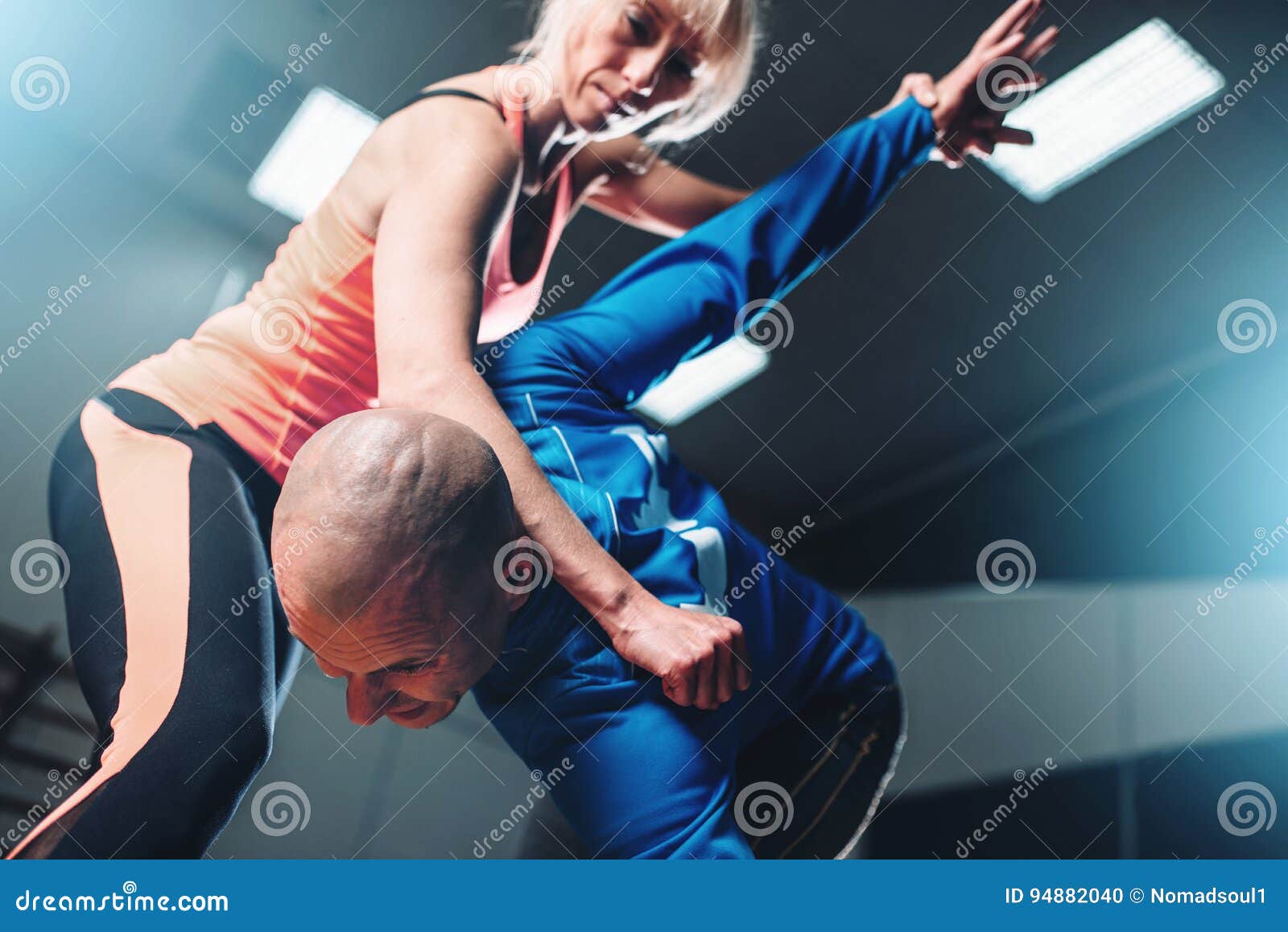 male and female fighters, self-defense technique