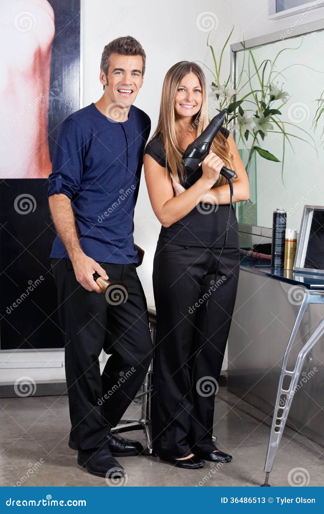 Male And Female Hairdressers Standing Together Stock Image Image