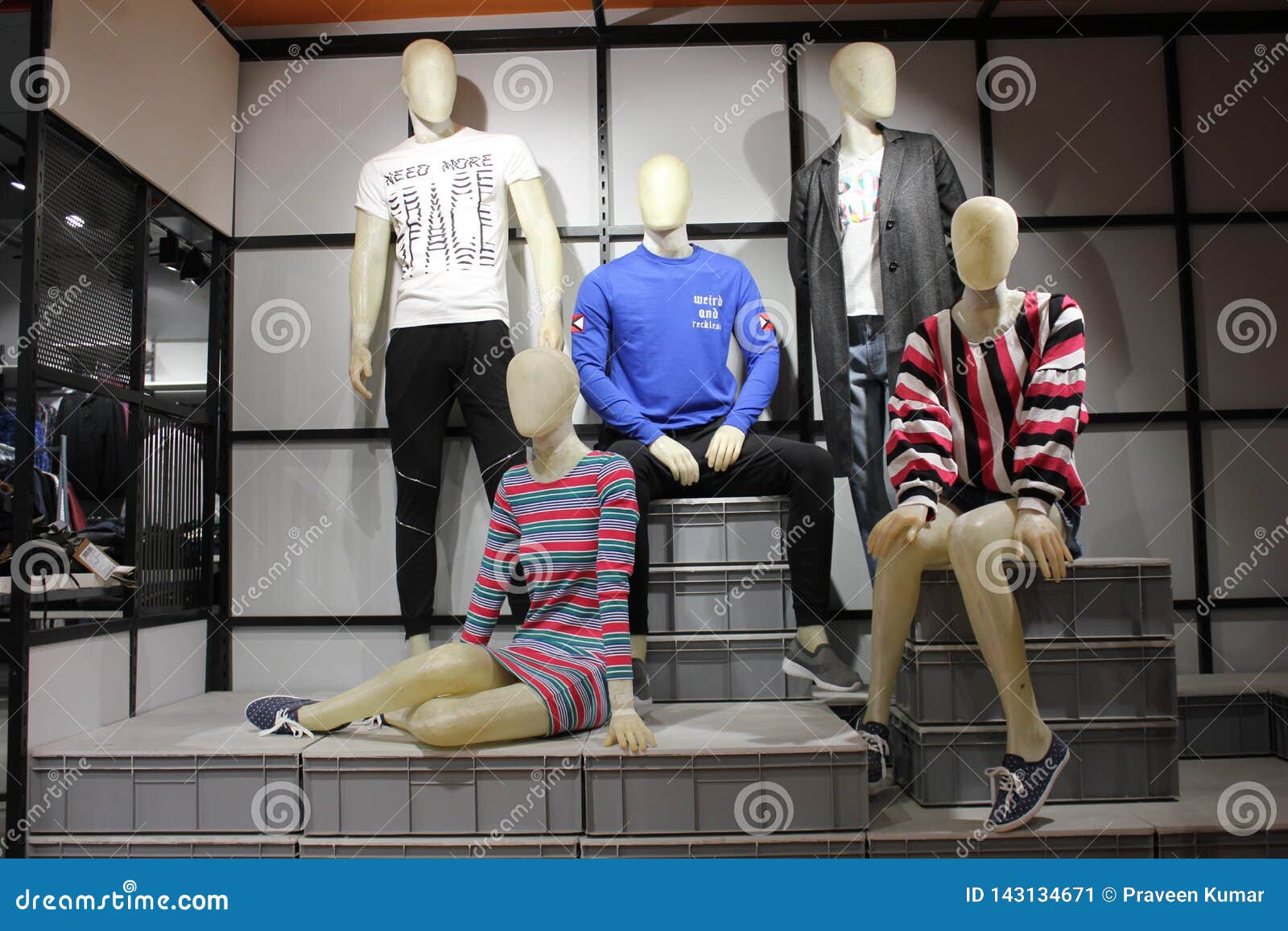 Male and Female Mannequins in Western Fashion Displayed in a Clothing ...