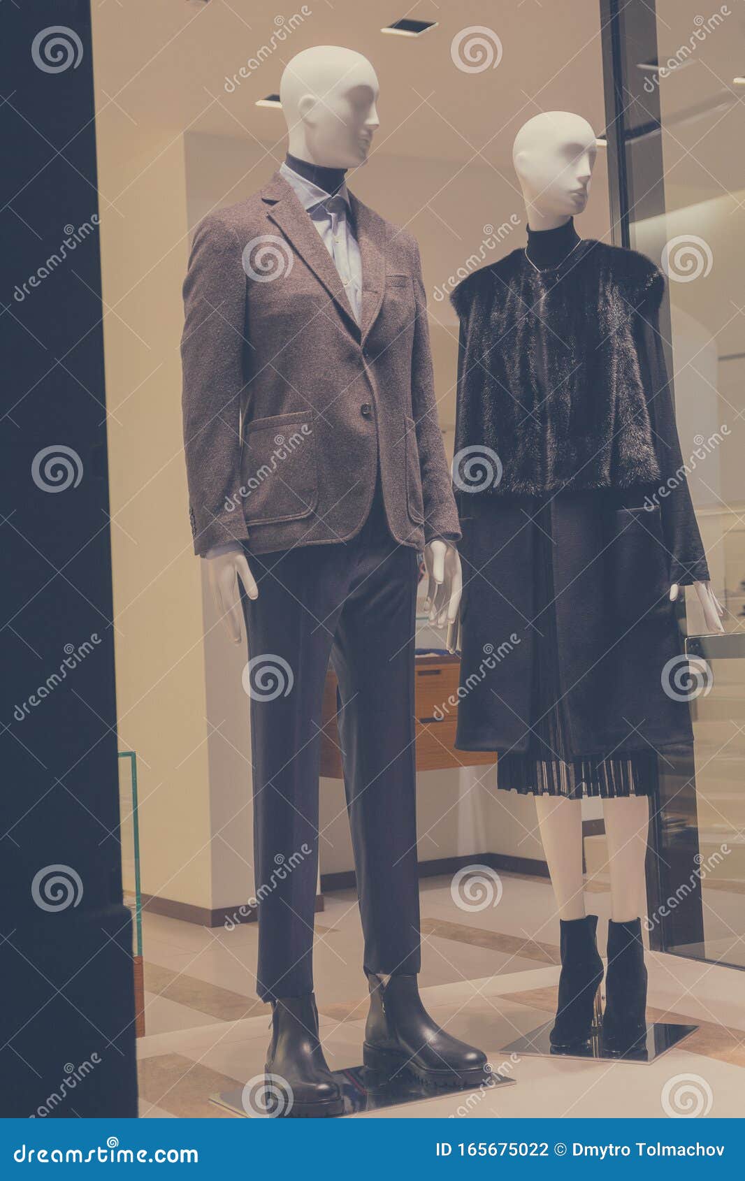 Male and Female Mannequins on the Shop Window Stock Photo - Image of ...