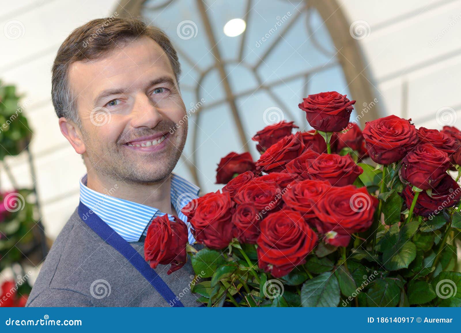 Male Florist Holding Bunch Roses Stock Image Image of bloom, beauty 186140917
