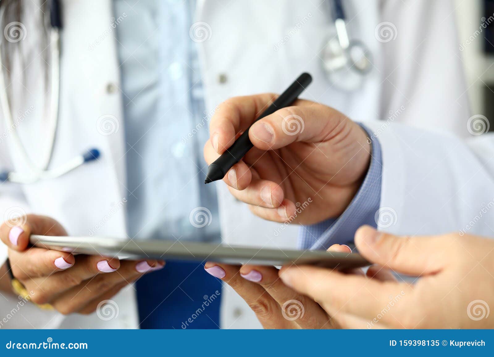 Male GP Making Electronic Notes in Tablet Pc Stock Image Image of