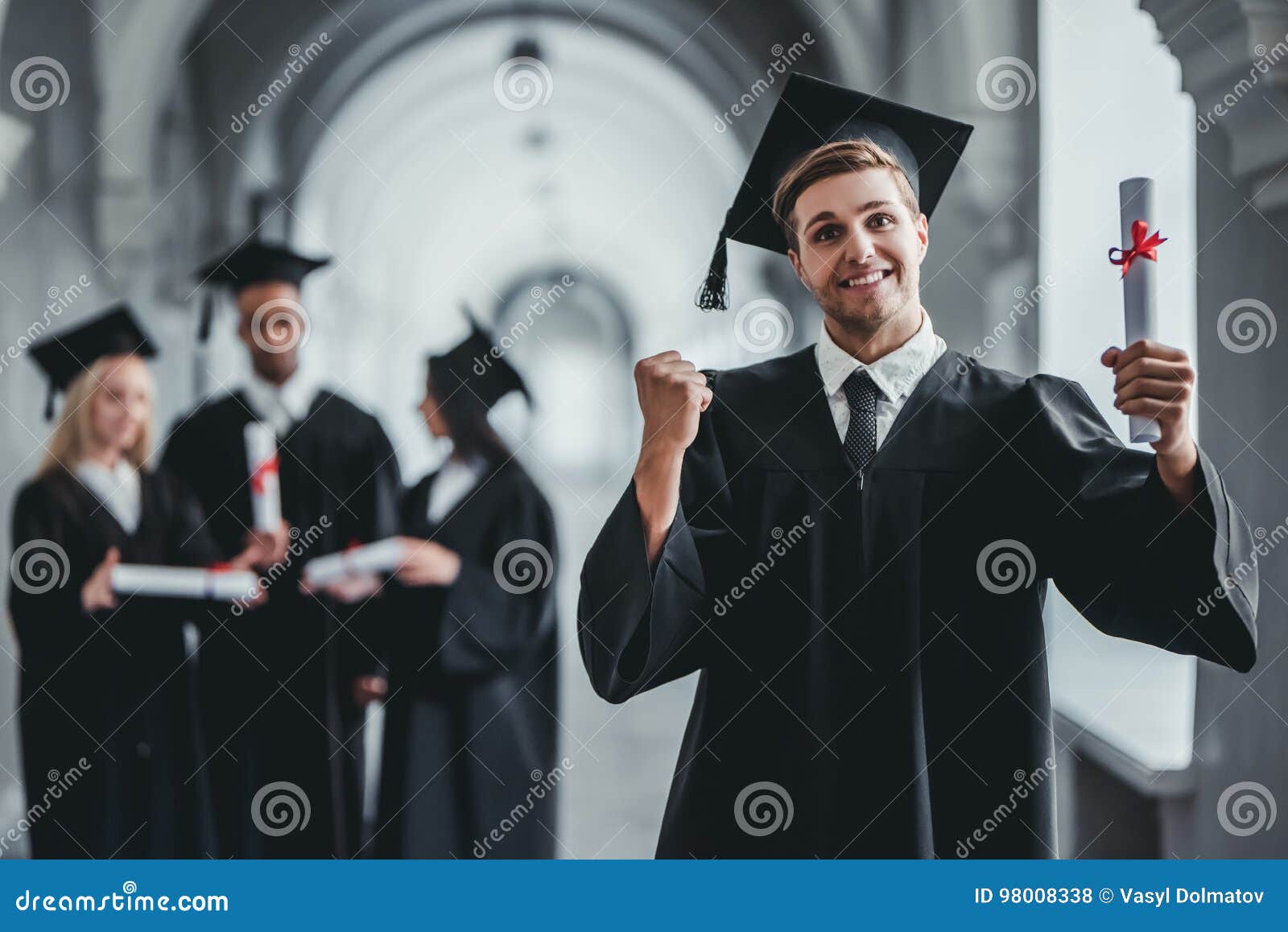 male graduate in university