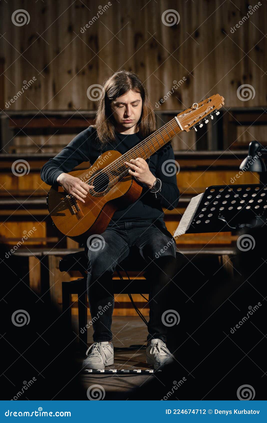 male guitarist on stage