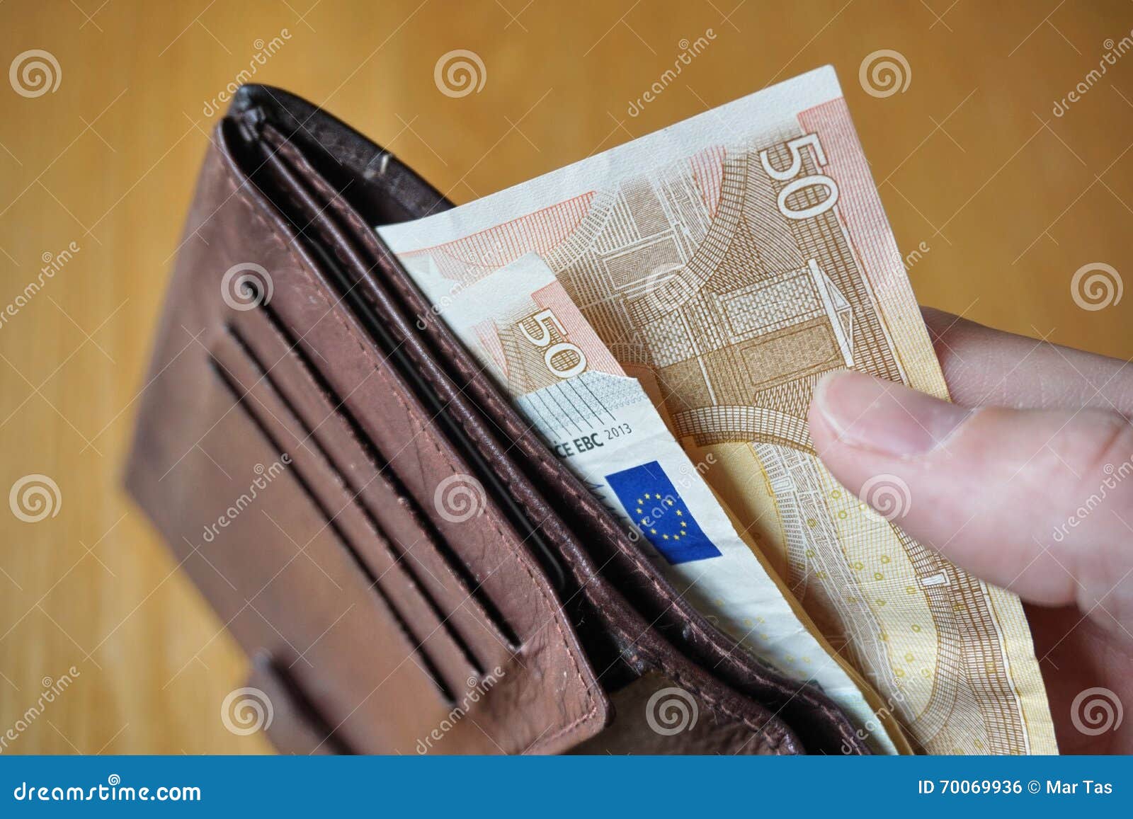 Male Hand Holding A Leather Wallet And Withdrawing European Currency (Euro, EUR) Stock Photo ...